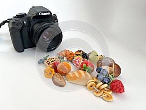 Grodno, Belarus - 03.06.2022: Canon camera in the process of shooting small objects