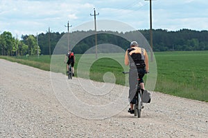 Grodno, Belarus, June 01.2019: Cycle tourism. Active rest on the nature. Travel by Bicycle. Weekend in the country. Two cyclists