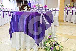 GRODNO, BELARUS - MAY 2014: Beautiful flowers on elegant dinner table in wedding day. Decorations served on the festive table in