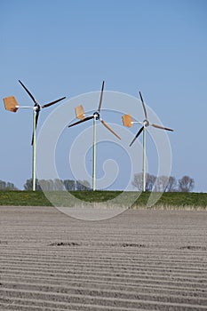 Groningen, the Netherlands - April 29 2020: Small wind turbines with wooden blades of EAZ Twelve Wind. With the blades