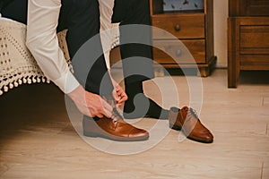 Groom black elegant shoes. Wedding detail. Close up