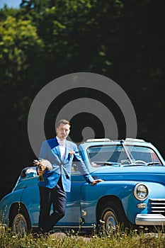 Groom with Bouquet at Cabriolet