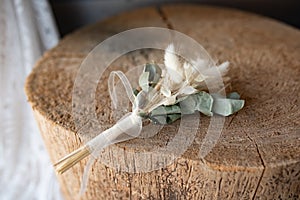 Groom boutonniere in boho style