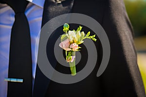Groom boutonniere on his jacket