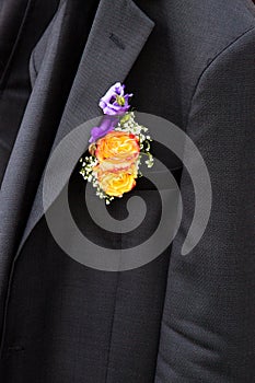 Groom boutonniere on jacket