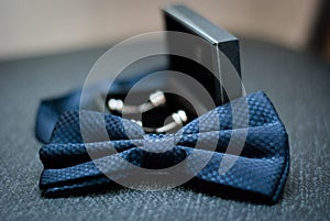 Groom bow tie and cufflinks photo