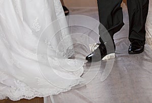 Groom breaking a glass at a Jewish wedding