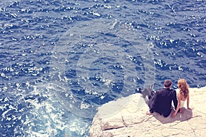 Groom and bride near the sea