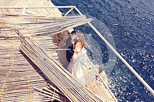 Groom and bride near the sea