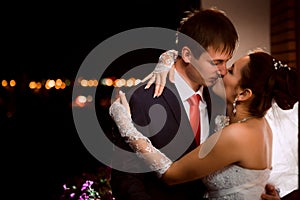 Groom and bride at night