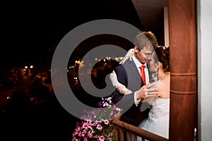 Groom and bride at night
