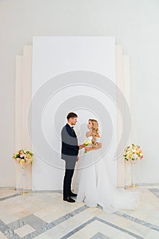 the groom and the bride at the official wedding ceremony