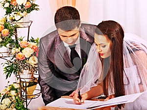 Groom and bride register marriage