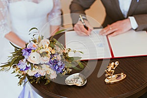 Groom and bride register marriage