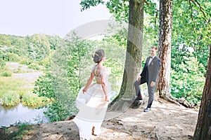 Groom and bride together. Wedding romantic couple outdoor