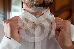 Groom detail with elegant tie