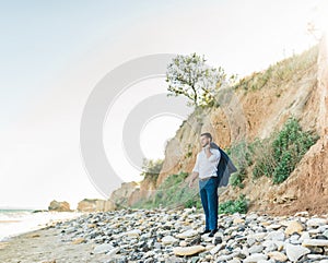 Groom getting ready in the morning for wedding ceremony on the beach