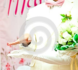 Groom grabs bride's hand on wedding day