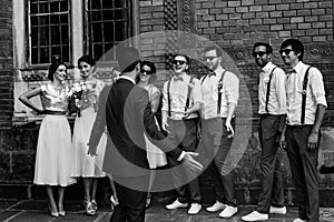 Groom with the groomsmen and bridesmaids