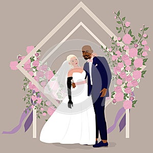 The groom and inclusive bride in a wedding dress