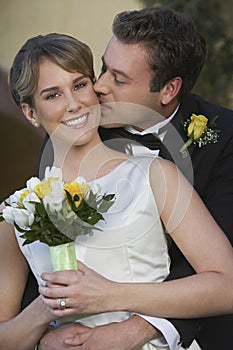 Groom Kissing Bride