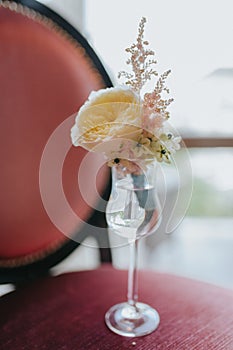 Groom`s orange blossom with rose and wild flowers