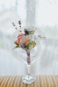 Groom`s orange blossom with rose and wild flowers waiting for gr