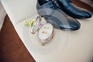 Groom set clothes. Wedding rings, shoes, cufflinks and bow tie