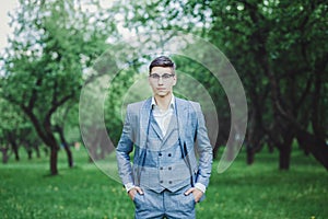 Groom at wedding suit waiting for bride