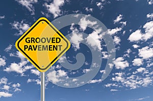 Grooved pavement road sign