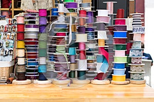 Grosgrain and another type of ribbons in a haberdashery.