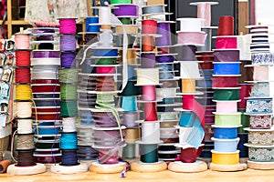 Grosgrain and another type of ribbons in a haberdashery.