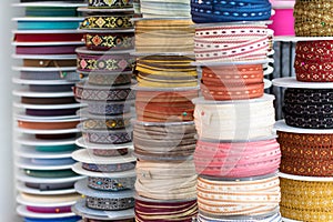 Grosgrain and another type of ribbons in a haberdashery.