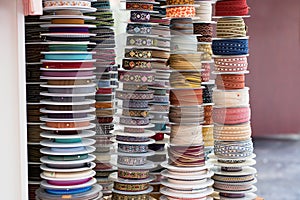 Grosgrain and another type of ribbons in a haberdashery.