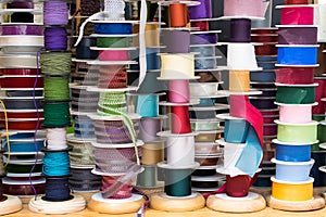 Grosgrain and another type of ribbons in a haberdashery. photo