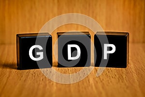 Gross domestic product or GDP word on black block