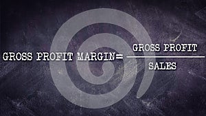 gross profit margin equalvalant to gross profit upon sales formula displayed with chalkboard illustration