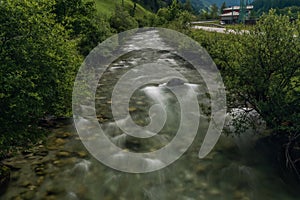 Grossarler Ache river in sunny cloudy morning in Austria