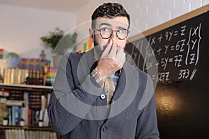 Grossed out teacher due to a horrible smell in classroom photo