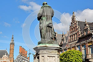 The Grote Markt Square with ornate and colorful traditional buildings with the statue of Laurens Janszoon Coster