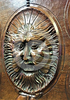 Grotesque mask into a castle, wood, face and magic