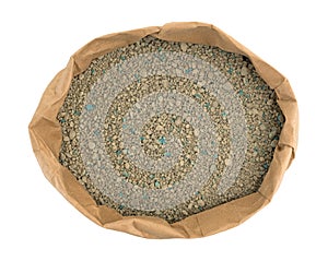 Ground clay cat litter in an opened bag