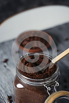 Ground coffee in a hermetic glass jar