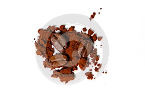 Ground coffee and roasted beans on a white background, isolated.