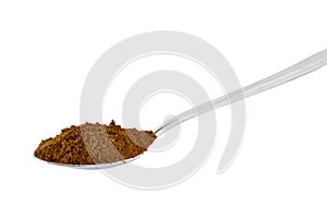 Ground coffee in a spoon