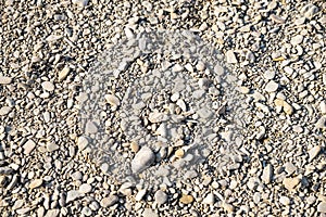 Ground covered with stones and pebbles as background