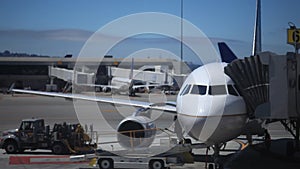 Ground crew working on unloading an airplane