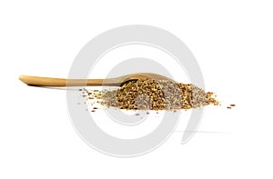 Ground or crushed brown flax seed or linseed isolated on white.