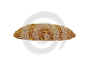 Ground or crushed brown flax seed or linseed isolated on white.