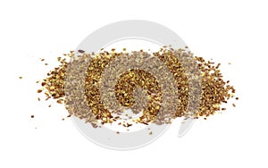 Ground or crushed brown flax seed or linseed isolated on white.